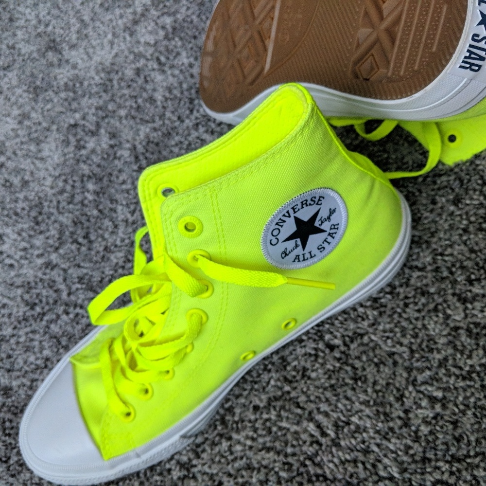 Neon green Converse high tops